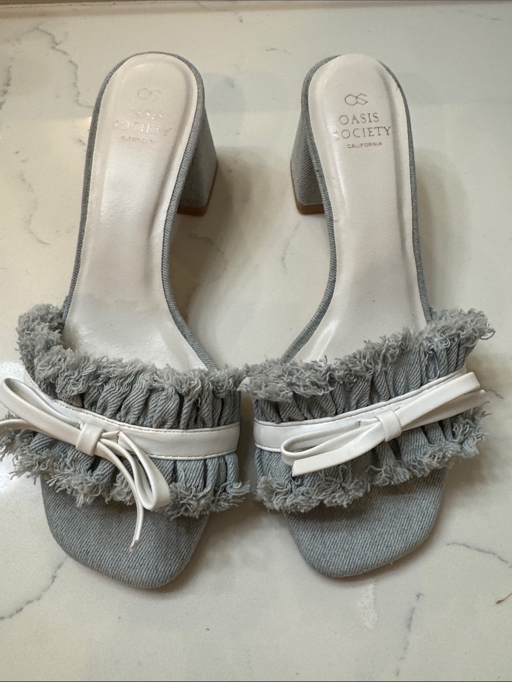 Oasis Society California Light Denim Frayed Ruffle Slide Heels with White Bow